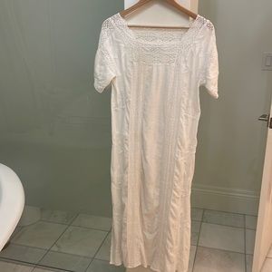 White maxi dress with crochet details